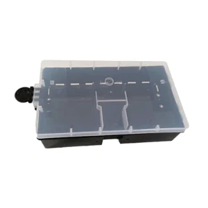 Clear rodent bait station with a secure black locking mechanism, showcasing an internal compartment for effective pest management.