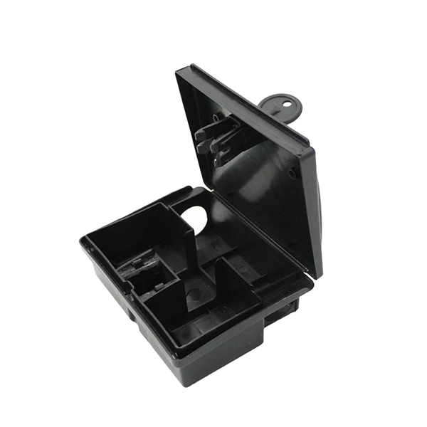 Small black mouse bait station with an open lid, showcasing internal compartments for secure rodent baiting.