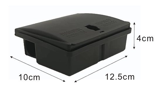 Open mouse bait station displaying orange and blue bait blocks securely placed in interior compartments.