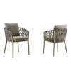 Two Pietra outdoor dining chairs with woven backrests and cushioned seats