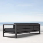 Side view of Notte Outdoor Three Seater Sofa with a sleek metal frame