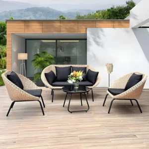 Stylish outdoor setup featuring Elysium Rattan Outdoor Armchairs paired with a sleek round table on a wooden deck