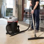 Industrial Wet and Dry Vacuum Cleaner in use, demonstrating its efficiency in cleaning commercial spaces