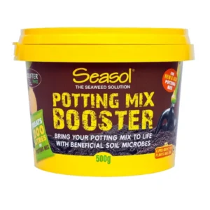 Seasol Potting Mix Booster 500g container with yellow lid and dark background showing soil microbes